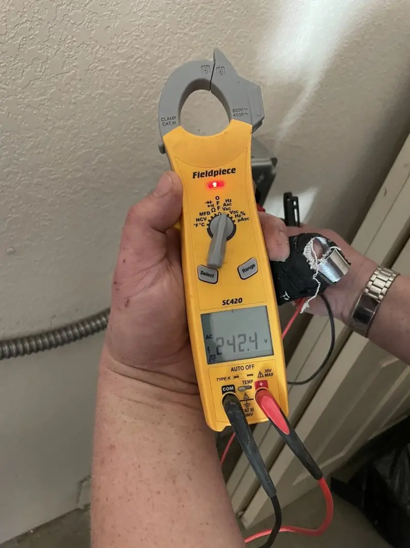 Voltage testing with clamp meter during Aluminum Wiring Replacement in Pearl